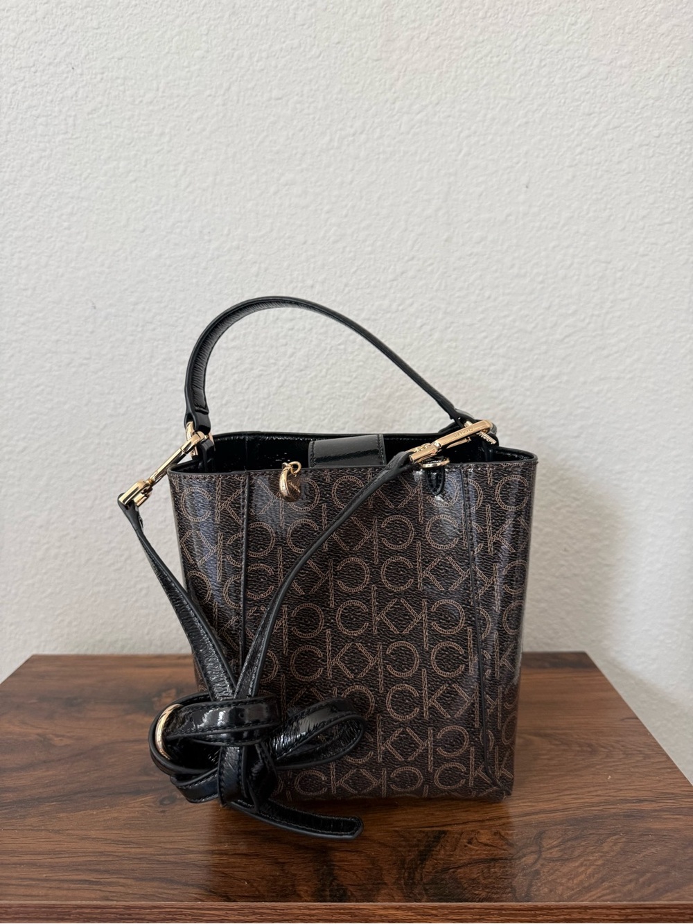 NWOT - Calvin Klein Brown Monogram Bucket Bag/ Black Trim